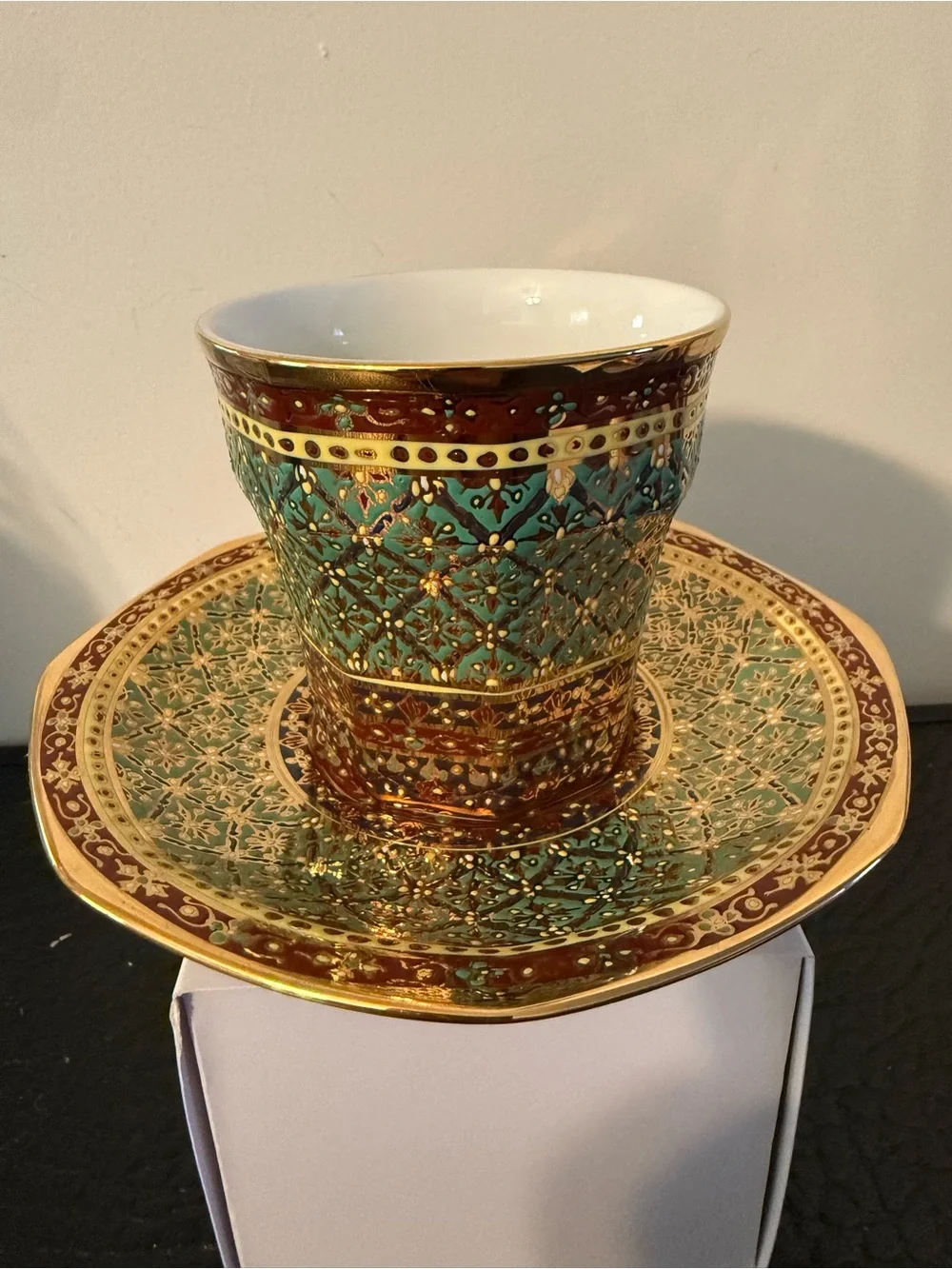 PIPATANA BENJARONG Green red and Gold Porcelain Teacup with Saucer.